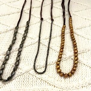 Set of 3 beaded necklaces on leather cords